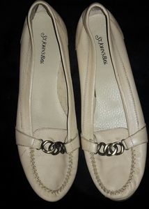 Flat cream colored loafers